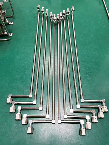 Finished orbital weld assembly 10